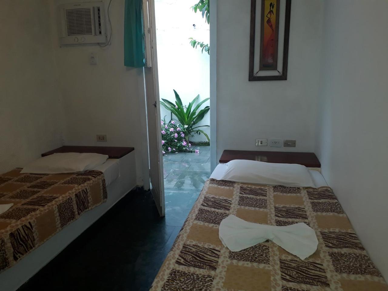 Quarto com 2 Camas de Solteiro e Varanda